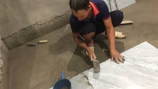 Home Renovation Magic A Builders Tile Transformation [upl. by Lalitta]