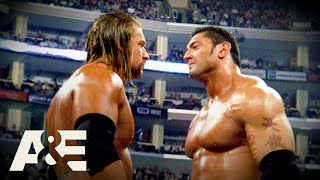 Batista BETRAYS Triple H Leading to EPIC Rivalry  WWE Rivals  AampE [upl. by Quirita]