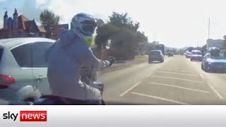 Road rage driver knocks motorcyclist off bike after 50mph chase [upl. by Chivers248]