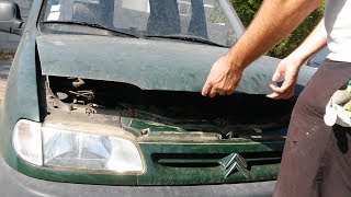 Comment refermer un capot de voiture Citroën Berlingo [upl. by Ettegirb]