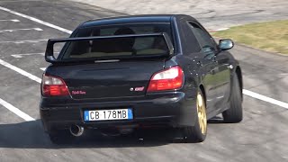 Handbrake Turns amp AWD Drifts  Subaru Impreza WRX STI vs Mitsubishi Lancer EVO IX [upl. by Einnov125]