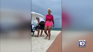 Police in Miami Beach search for woman behind unprovoked attack on beachside tourist [upl. by Anaitsirc]