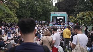 Locals and tourists gather in Paris as Olympics opening ceremony kicks off [upl. by Aneeuqal]