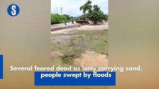 Several feared dead as lorry carrying sand people swept by floods [upl. by Leibrag3]