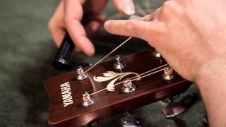 Stringing a Steel String Acoustic Guitar [upl. by Mauricio]