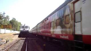 Indian Railways12431 TVC Rajdhani express overtakes the 10104 Mandovi express in full glory [upl. by Nywroc]