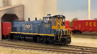 Athearn Genesis CSXT MP15AC Pulling a Small Cut of Cars out of the Cemex Quarry [upl. by Pfosi616]