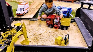 Ollis FunFilled Adventure Playing with Bruder Construction Vehicles  Trucks Diggers and More [upl. by Lerrad419]