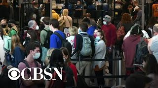 Omicron variant causes holiday travel chaos with thousands of flights canceled [upl. by Aicaca95]