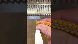 Picking up shoulder stitches onto the needles on a knitting machine knittingmachine seaming [upl. by Acinimod]