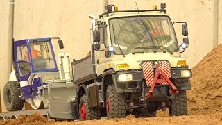 MB UNIMOG RC SPECIAL TRUCK HAULING SEMITRAILER WITH COMPACTOR CONSTRUCTIONWORLD [upl. by Sidney]