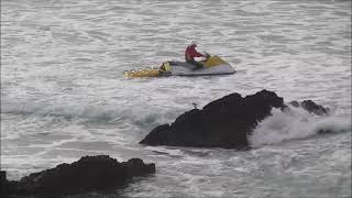 Rescue Surfers washed into rocks by rip current Newquay [upl. by Anairotciv]