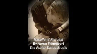 Nasallang piercing by Aaron Winegeart [upl. by Leahcin]