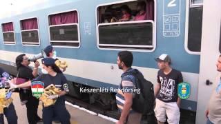 Migrants throwing food onto train tracks [upl. by Ligriv136]