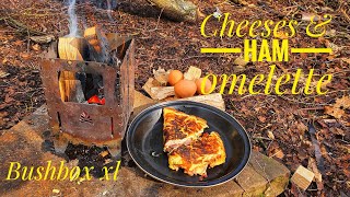 Bushcraft cooking a cheese and ham omelette on my bushbox xl stove nice dinner in the woods [upl. by Ennoira]