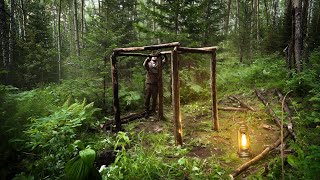 A man builds a log cabin for wintering in the forest Bushcraft [upl. by Relluf]