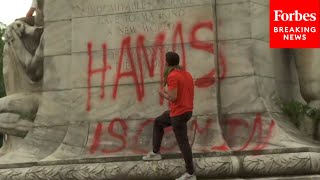 SHOCK MOMENT ProPalestinian Protestor Defaces Christopher Columbus Statue With ProHamas Message [upl. by Umont]