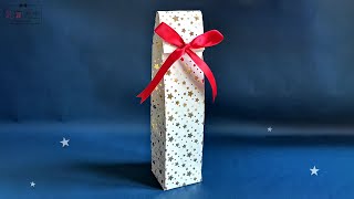 How to wrap a bottle as gift with wrapping paper  Gift wrapping ideas for wine bottle [upl. by Eilah]