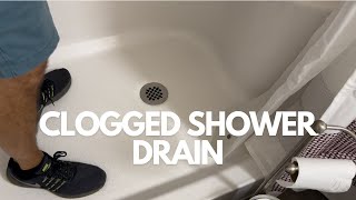 Unclog Your Shower Drain  2 Minute Fix [upl. by Peterman]