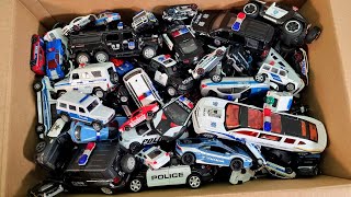 Box Full Of Police Car Diecast Cars Large collection of police diecast cars from different countries [upl. by Stanislas]