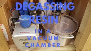 Degassing resin in vacuum chamber [upl. by Adnawad]