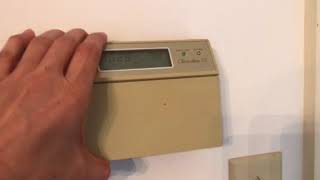 Honeywell chronotherm III thermostat How to change the batteries [upl. by Nerrej292]