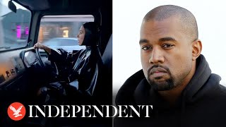 Kanye West films wife sporting hooded latex suit while driving [upl. by Ludwig]