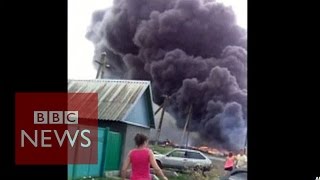 MH17 New footage shows crash aftermath  BBC [upl. by Nicolette344]