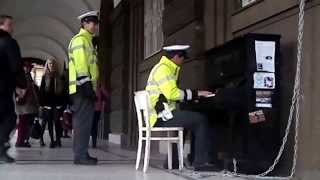 Yiruma  River Flows In You  street piano Prague  song performed by Czech police [upl. by Edik209]