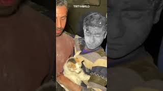 Palestinian boy rescued from the rubble refuses to part with his cat [upl. by Ydisac]