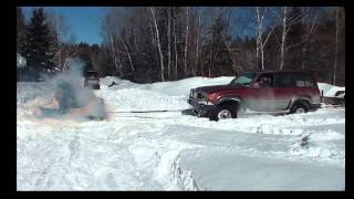 SNOBUNJE PULLS TRUCK AND TRAILER OUT OF THE SNOW [upl. by Annoyk]