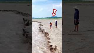 Two Guys in Danger at Qiantang River  Spring Erosion Quantangriver shorts [upl. by Mcnelly]