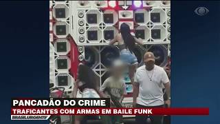 Traficantes ostentam armas em baile funk [upl. by Raffaello]