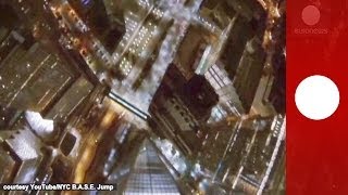 Night base jump in NYC Skydivers plunge from One World Trade Center [upl. by Cyrille]