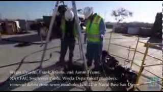 NAVFAC Southwest Public Works plumbers clear debris from manhole [upl. by Asilej]