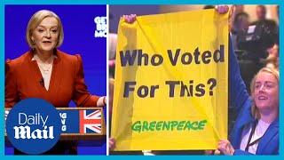 Who voted for this Moment Greenpeace protesters heckle Liz Truss during speech at Conference [upl. by Airdnas741]