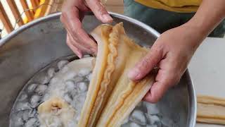 How to clean geoduck for sashimi and porridge [upl. by Ylrbmik455]