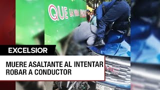 Delincuente intentó asaltar a conductora y ésta lo dejó prensado entre dos vehículos [upl. by Hpesoy]