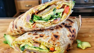 HOW TO MAKE CHAPATI WRAP  UGANDAN CHAPATI ROLEX  PARATHA ROLL  Egg Chapati Roll [upl. by Arlette]