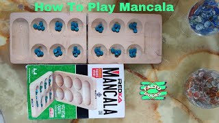 Mancala Explanation How to play Mancala  كيف تلعب المنقلة [upl. by Prober461]