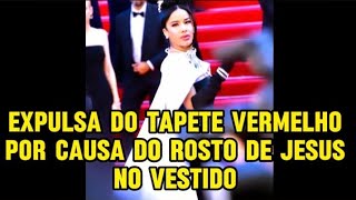 MASSIEL TAVERAS IMPEDIDA DE MOSTRAR VESTIDO DESENHADO COM ROSTO DE JESUS EM CANNES noticia [upl. by Anawyt40]