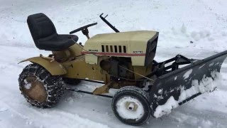 1972 Sears ST10 10 HP Lawn Tractor Plowing Snow [upl. by Zarger444]