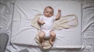 How to Swaddle a Newborn Baby  Embé® [upl. by Oiliruam]