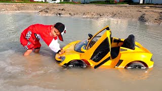 Niki ride on childrens car and stuck in a puddle [upl. by Eirual]