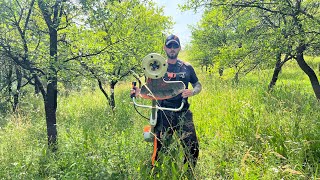 Stihl Fs 560C with durocut 404 trimmer head cutting big grass [upl. by Kroo]