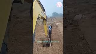 Excavator digging trench and draining water pipe [upl. by Hermione]