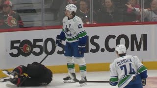 Quinn Hughes Game Misconduct for Boarding Josh Norris [upl. by Fulmis]