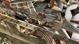 Slot cars Track installed into 40 foot Lionel Fastrack 027 Track Layout [upl. by Lertnom]