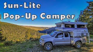 Truck Camper Tour at AMAZING campsite  SunLite Skyhawk SB [upl. by Yahc]