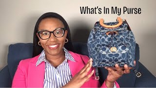 Whats inside my purse Coach Riya Denim Backpack  Purse Essentials [upl. by Baum604]